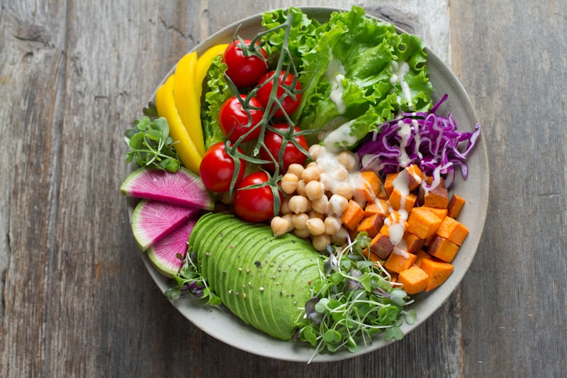 Colorful paleo rainbow salad bowl